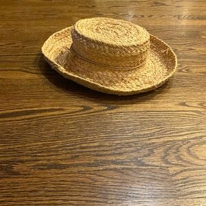 Helen Kaminski, basket hat.